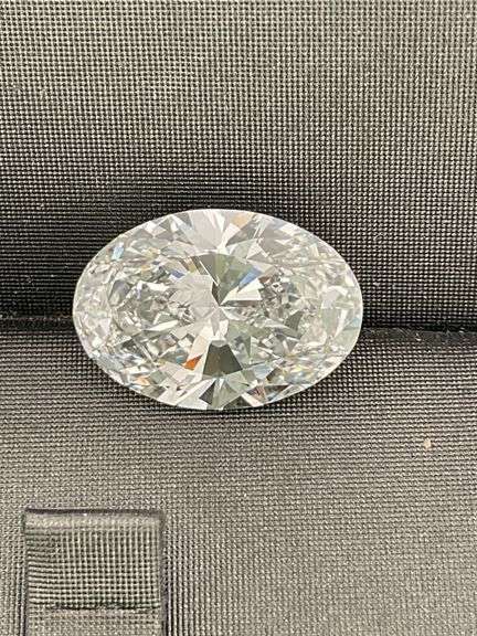 I.G.I CERTIFIED 7.05 CARAT OVAL SHAPED DIAMOND.