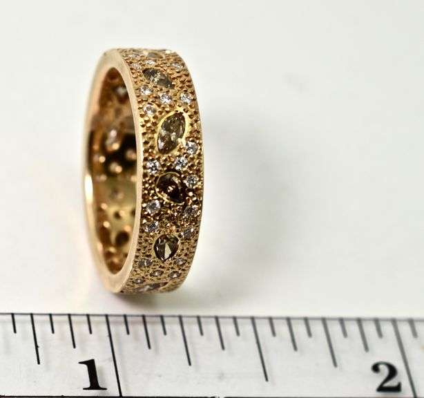 Unique 18K Rose Gold Band with Numerous Diamonds