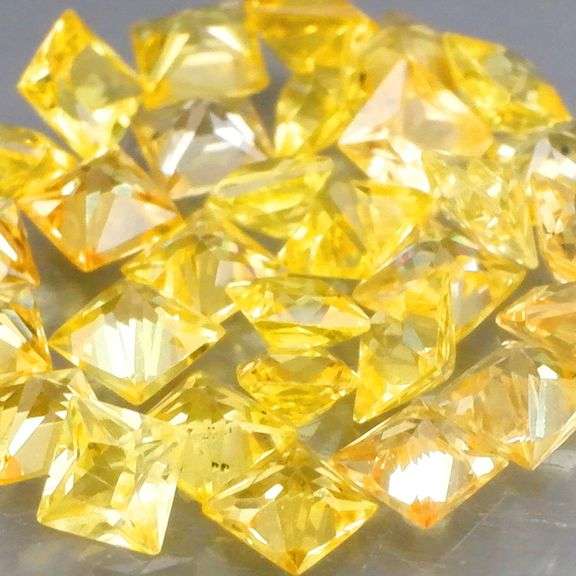 SUPERB!!! VS to eye clean 2.28ct canary yellow Sapphire set!
