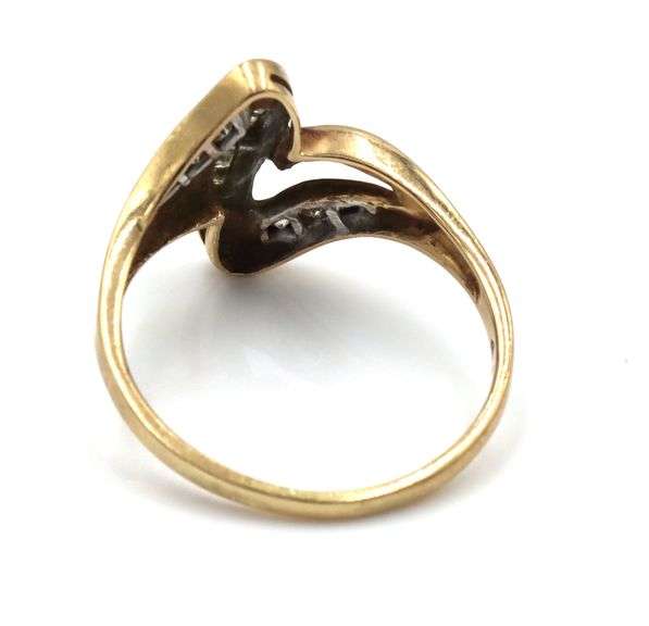 10kt Yellow gold diamond cross over ring