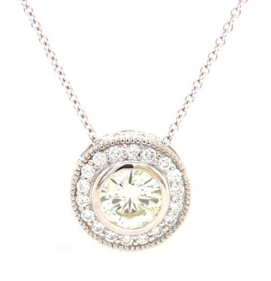 14kt White gold 1.17ct round brilliant cut diamond with 0.33ctw Milgrain diamond bezel set pendant o