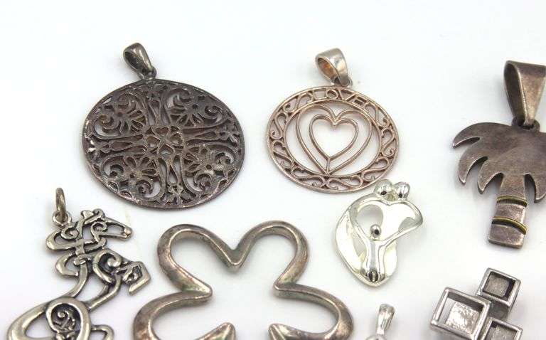 Lot of vintage 925 sterling silver pendants