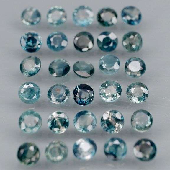 Heated only! 4.52ct blue green Sapphire set