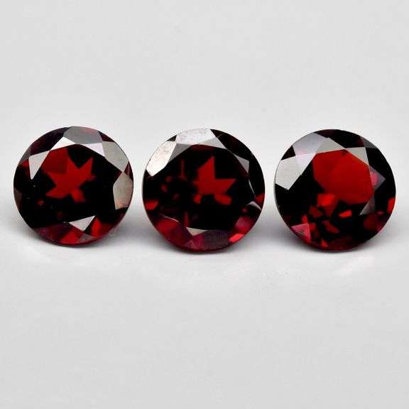Three round cut Garnets weighing 6.77 carats!!!