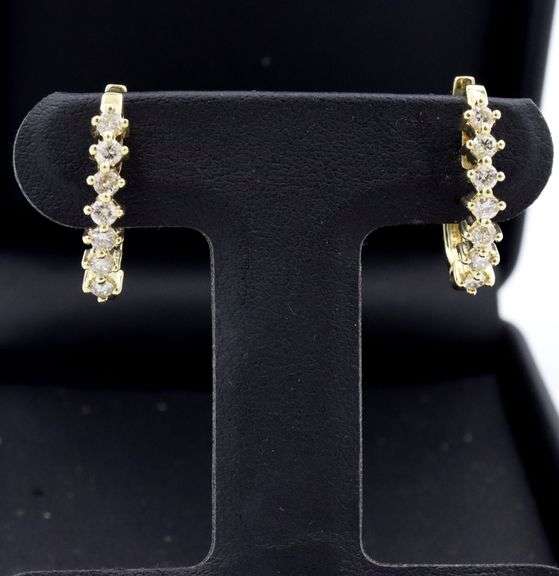14kt Yellow gold 0.70ctw 4 prong diamond J hoop earrings