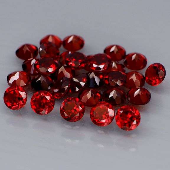 Fiery color!! Heavy 10.26ct Mozambique Garnet set!