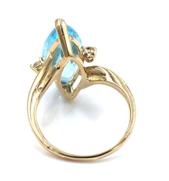 14kt Yellow gold marquise topaz and side diamond cocktail ring