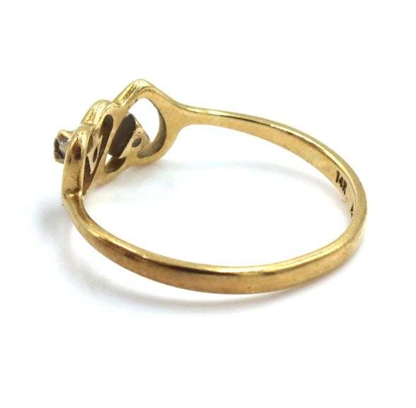 14kt Yellow gold 2 heart shaped ring with diamond accents