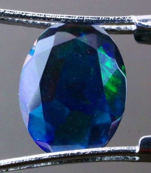 Floral patterned 1.32ct faceted Black Opal