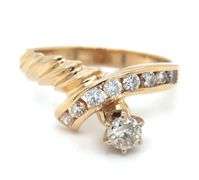 14kt Yellow gold 0.50ctw channel set twisted shank engagement ring