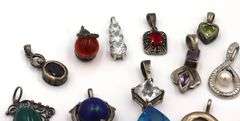 Lot of vintage 925 sterling silver pendants and charms