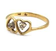 14kt Yellow gold 2 heart shaped ring with diamond accents