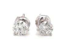 One pair of 14kt white gold 0.81ctw round brilliant cut diamond stud earrings