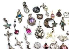 Lot of vintage 925 sterling silver pendants and charms