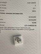 I.G.I CERTIFIED 5.03 CARAT ROUND BRILLIANT CUT DIAMOND. IDEAL CUT.