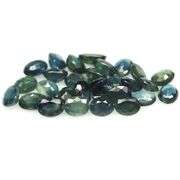 Heated only! 7.90ct blue green Sapphire set