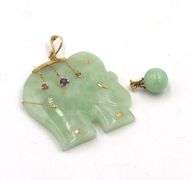 Lot of 14kt yellow gold green jade pendants