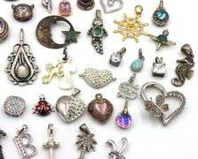 Lot of vintage 925 sterling silver pendants and charms