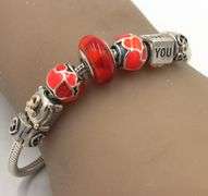 925 Sterling silver Pandora bracelet with 7 charms