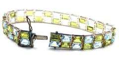 925 Sterling silver signed 2 row emerald cut cubic zirconia bracelet