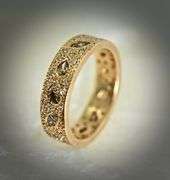 Unique 18K Rose Gold Band with Numerous Diamonds