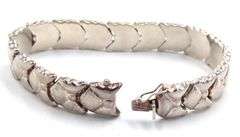 925 Sterling silver signed bow link bracelet