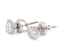 One pair of 14kt white gold 0.81ctw round brilliant cut diamond stud earrings