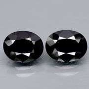 Matched! 13x10mm pair of all black Tektite weighing 13.52 carats!