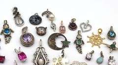 Lot of vintage 925 sterling silver pendants and charms