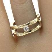 14kt Yellow gold 0.25ctw channel and Burnished set band