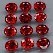 Lovely 5.51ct oval cut cherry red Garnet set
