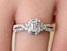 Stunning 14K Emerald Cut Halo Diamond Ring