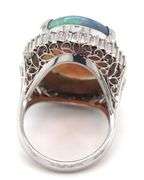 Platinum 10.92ct oval opal and 0.78ctw diamond halo ring