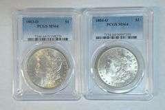 Lovely near Gem BU 1884-O & 1885-O Morgan Silver Dollars. PCGS MS64