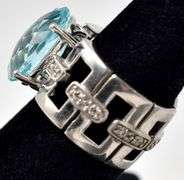 Blue Topaz and Cz gemstone Ring in Sterling Silver