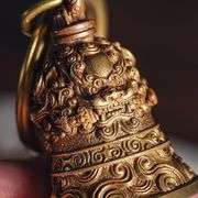 Brass and Copper Lion-Biting Sword Bell