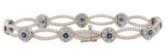1.35ctw Sapphire and 0.35ctw Diamond Halo Station Bracelet in 14K
