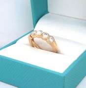 14kt Yellow gold bezel set Moissanite band
