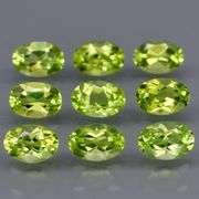 Fantastic 4.99ct 6x4mm oval cut Peridot set
