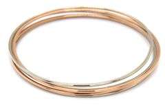 18kt White and yellow gold set of 5 bangles