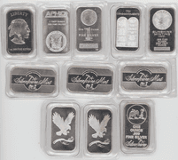 Ten attractive assorted 1 Troy Oz pure .999 fine silver bars in plastic