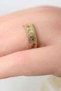 Unique 18K Rose Gold Band with Numerous Diamonds
