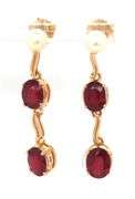 14kt Yellow gold oval ruby lead treated and pearl dangle earrings