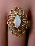 Traditional 18K Marquise Opal and Diamond Ring