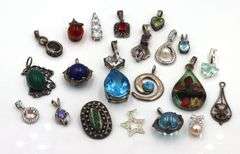 Lot of vintage 925 sterling silver pendants and charms