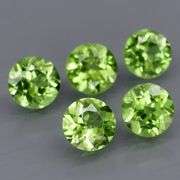 Five piece 6mm Peridot set weighing 4.32 carats