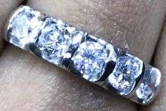 DAZZLING NATURAL DIAMOND PLATINUM WEDDING BAND