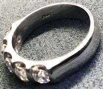 DAZZLING NATURAL DIAMOND PLATINUM WEDDING BAND