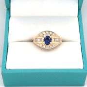 14kt Yellow gold 0.75ct sapphire with 0.50ctw diamond ring