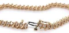 14kt Yellow gold 1.50ctw diamond S tennis bracelet